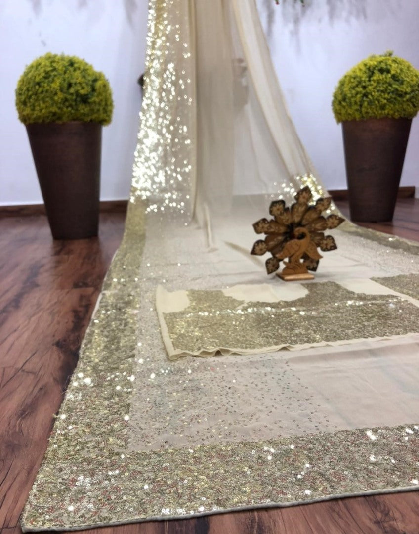 Golden georgette sequence with piping work saree