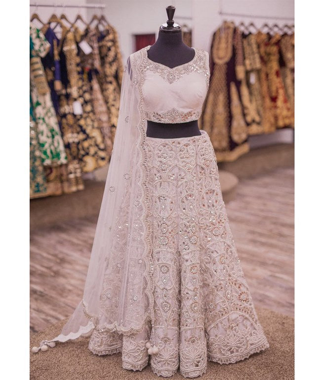 Gorgeous white embroidered heavy bridal lehenga