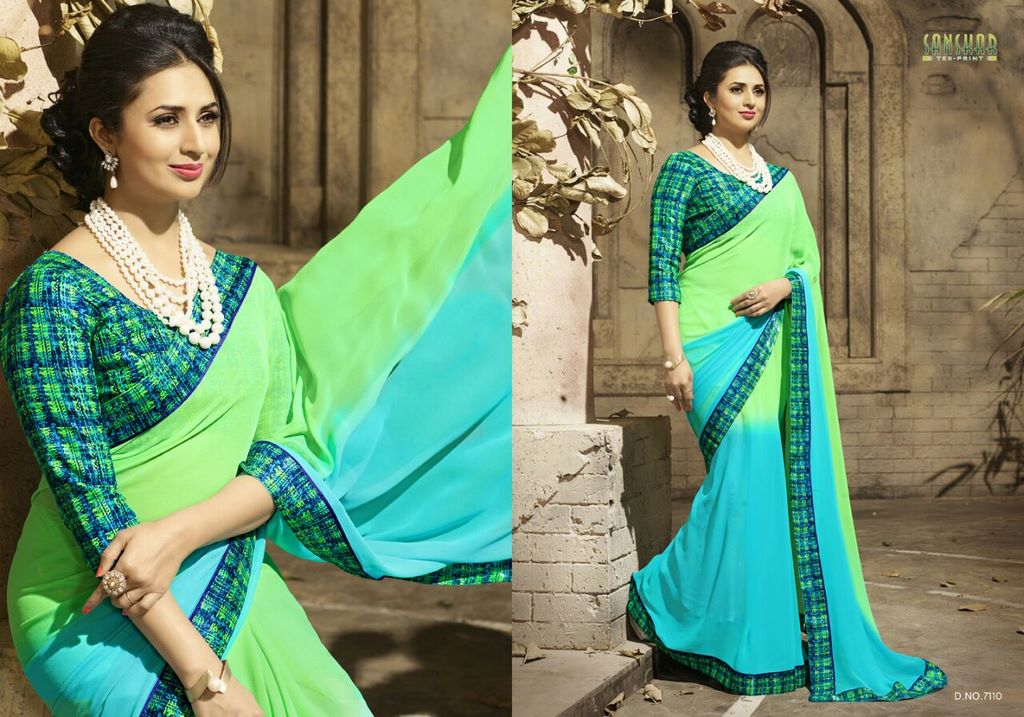 Gorgeous work wear green and sky printed saree