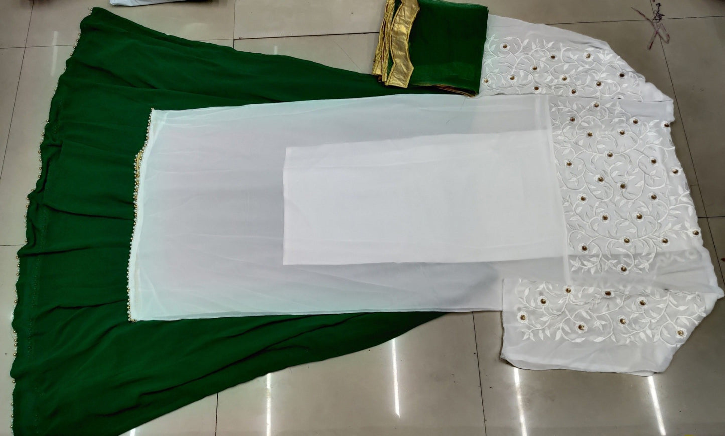 Green georgette lehenga with white long top lehenga suit