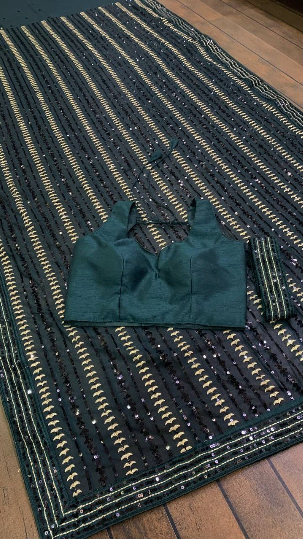 Green heavy embroidered sequence embroidery work party wear saree