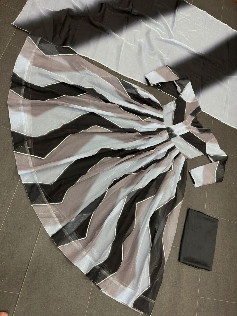 Grey organza silk print and ribbon work anarkali suit