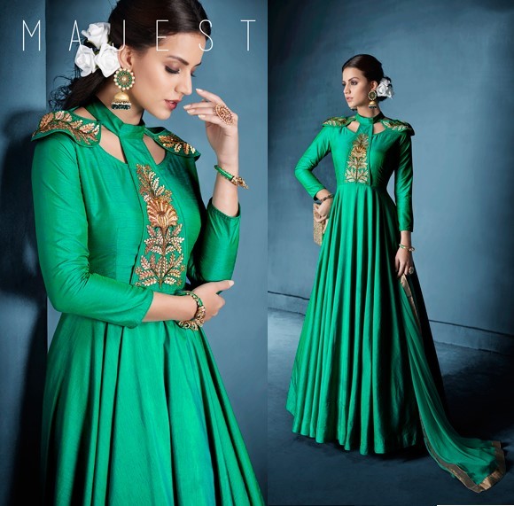 Light Green Colored Soft tapeta Silk Zari & Resham Embroidery with Stone and Moti Work Semi Stitched gown