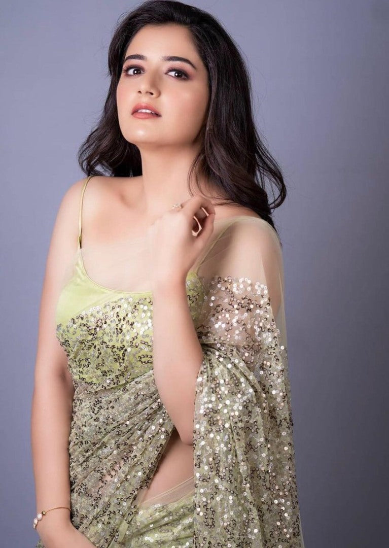 Light green heavy nylon net all over sequence work saree
