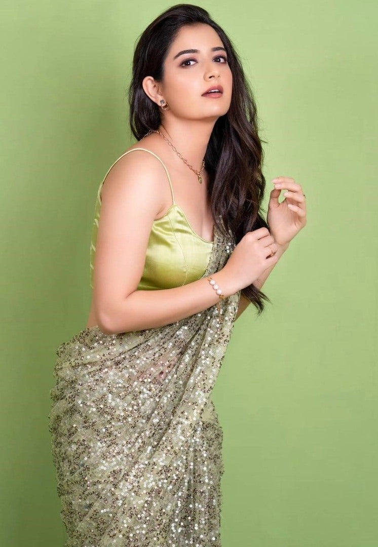 Light green heavy nylon net all over sequence work saree