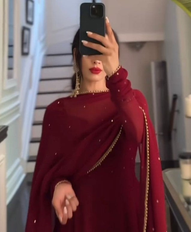 Maroon georgette plain heavy flair party wear gown