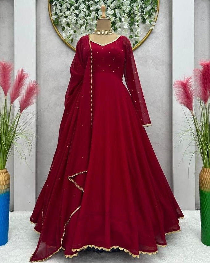 Maroon georgette plain heavy flair party wear gown