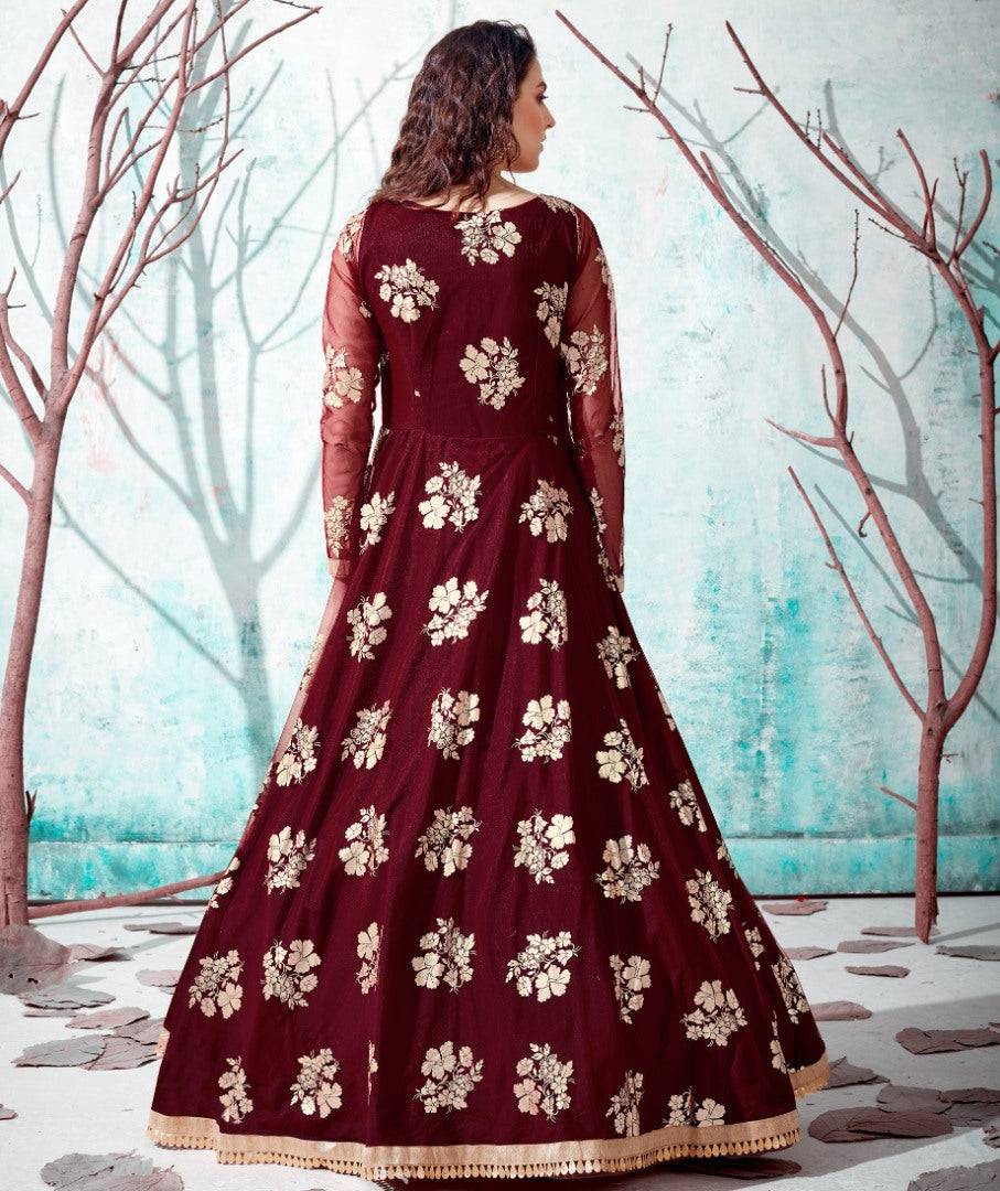Maroon net metallic foil work party wear designer gown
