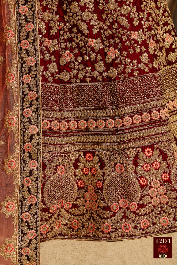 Maroon pure velvet designer heavy embroidered bridal lehenga