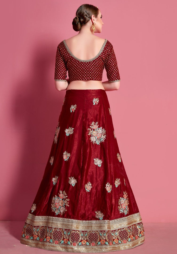 Maroon velvet silk embroidered party wear lehenga choli