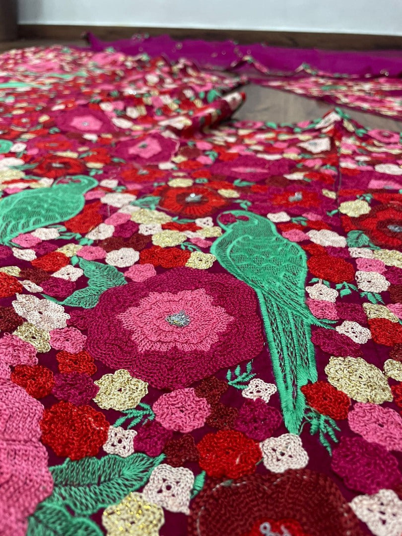 Maroon velvet tapeta heavy embroidered wedding lehenga choli