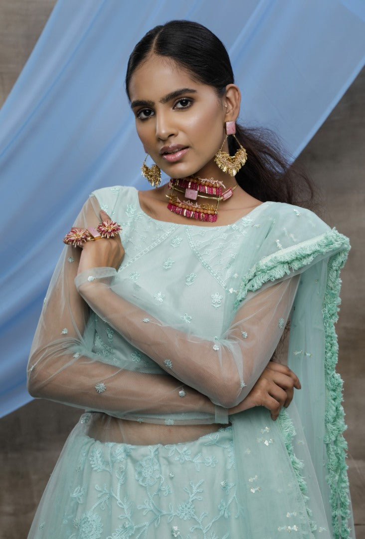 Mint green santoon embroidered party wear lehenga gown