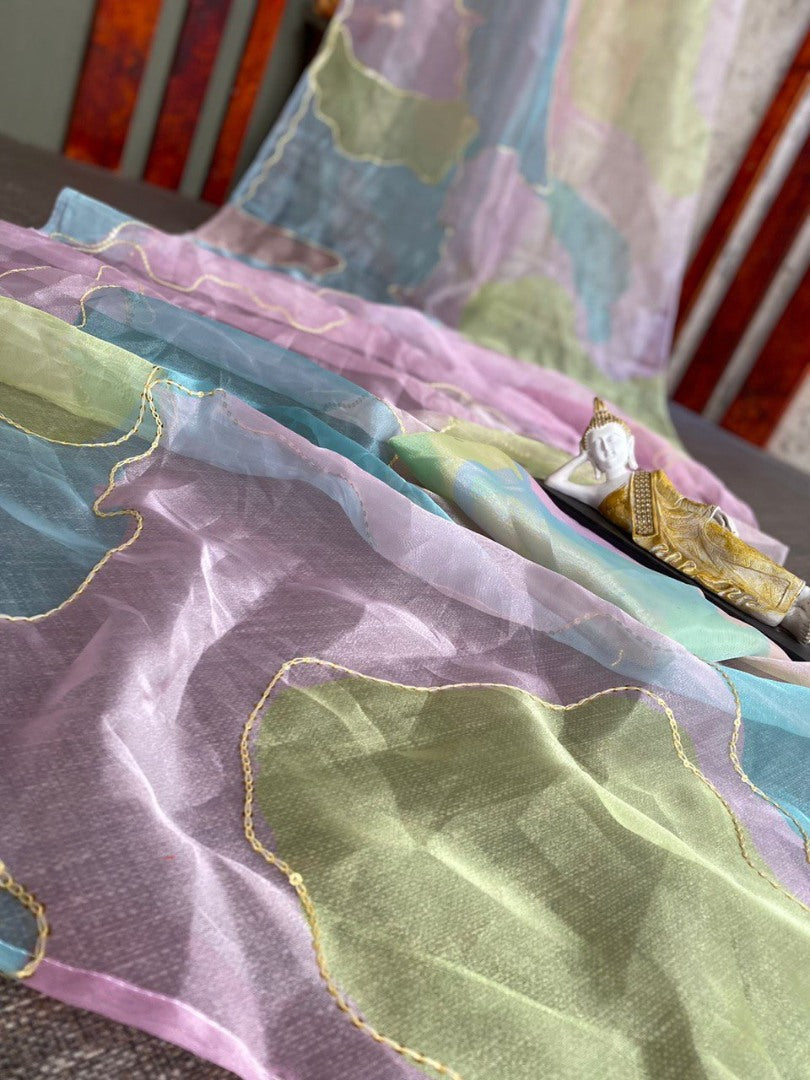 Multicolor organza print and sequence embroidered saree