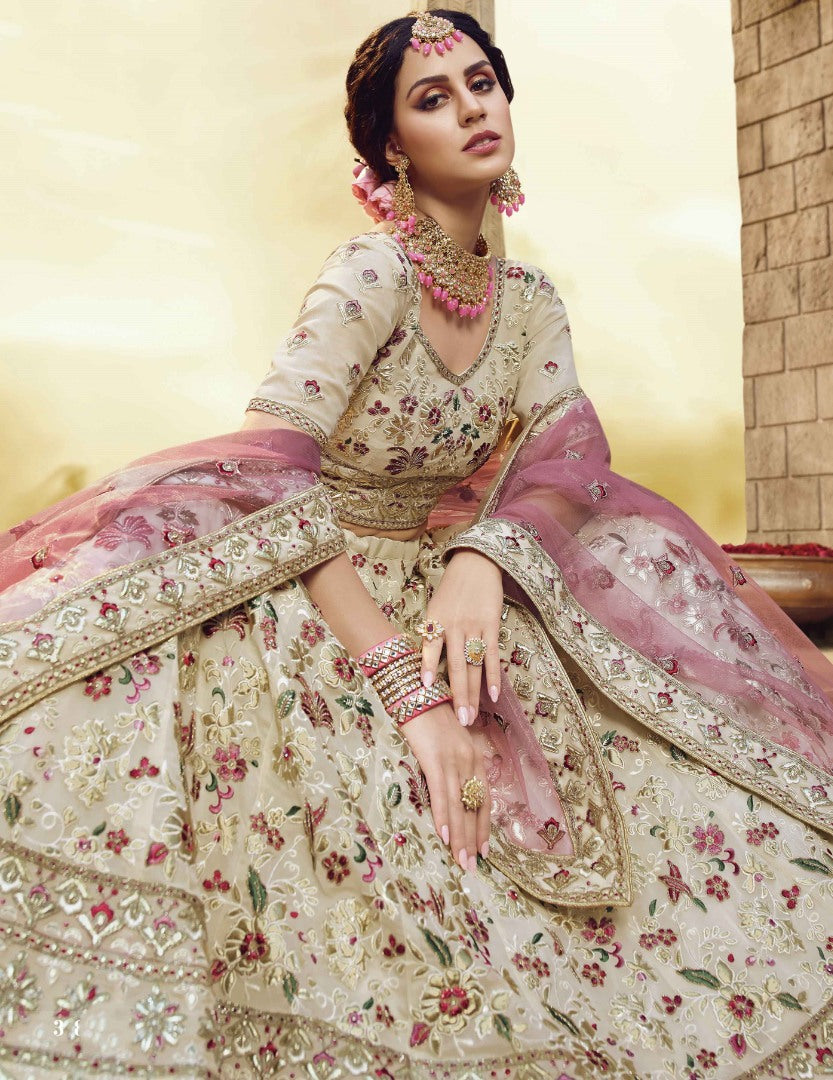 Off white georgette thread ruffle and zari work bridal lehenga choli