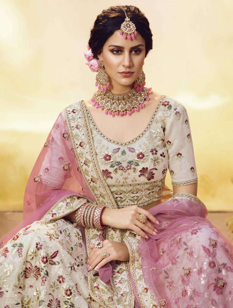 Off white georgette thread ruffle and zari work bridal lehenga choli