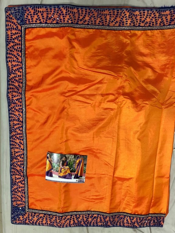 Orange paper silk embroidered festival wear saree
