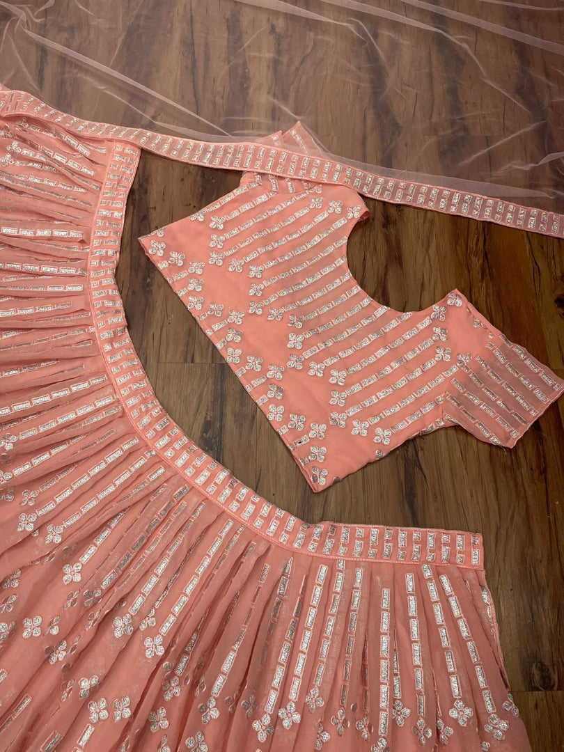 Peach georgette heavy embroidered wedding lehenga choli