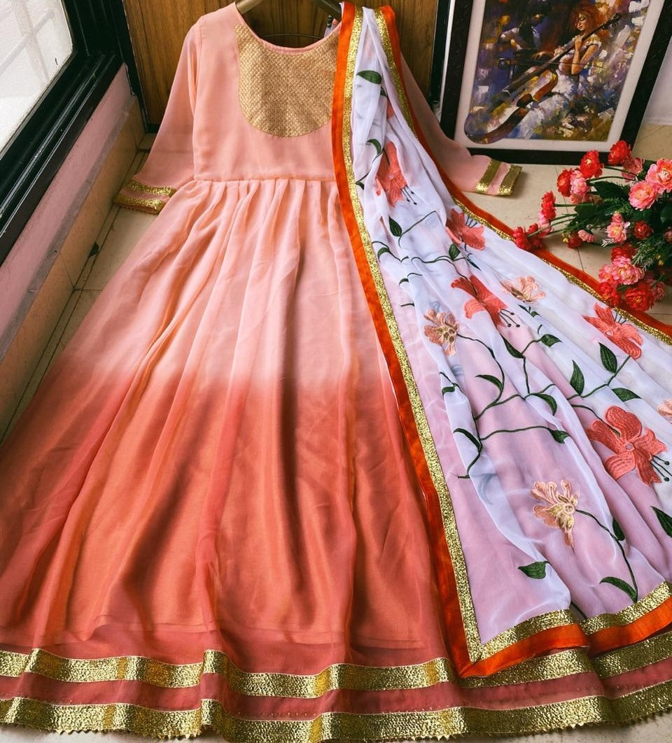 Peach heavy georgette with embroidered work gown