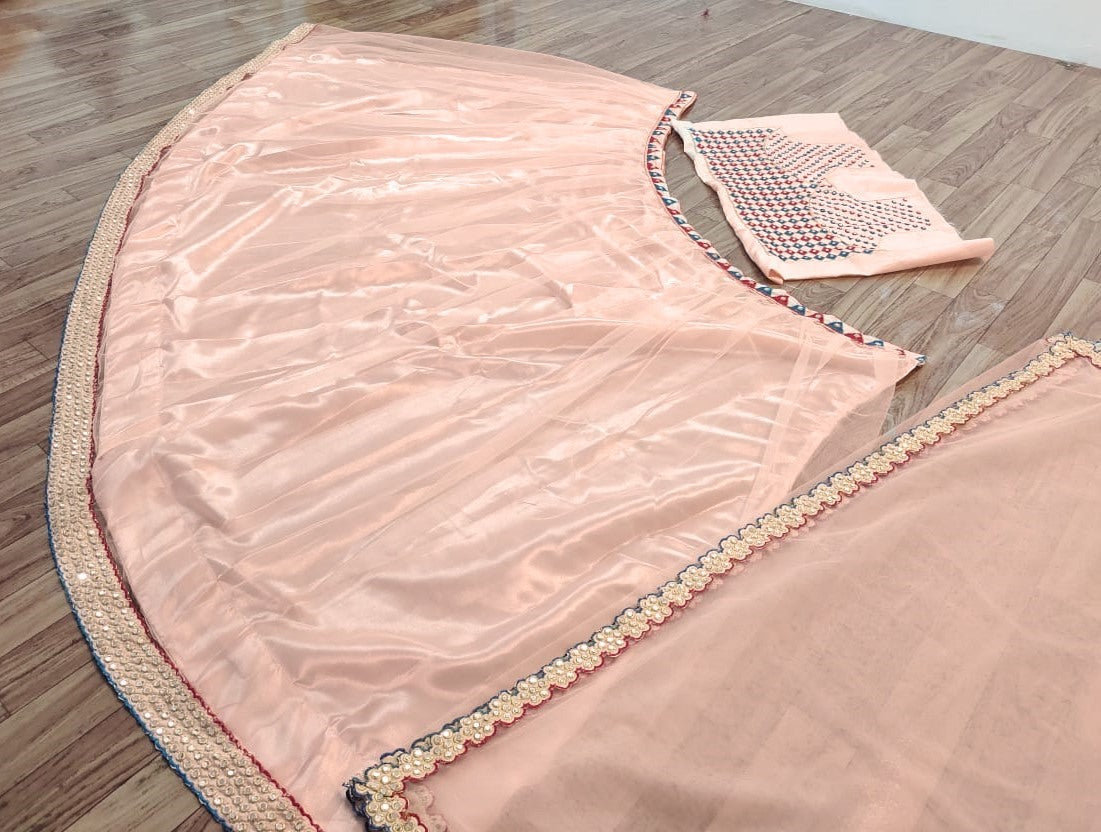 Peach mono net lehenga for ceremony