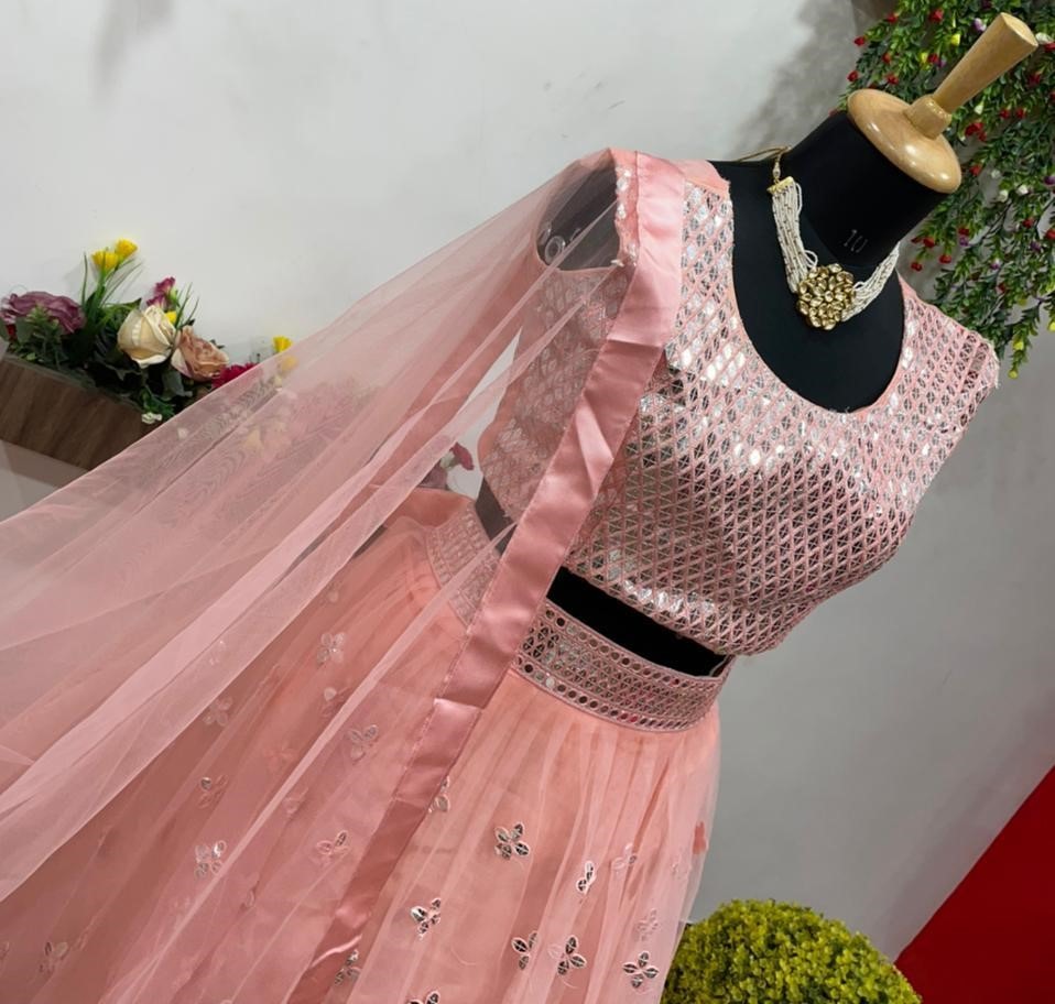 Peach net embroidered ceremonial lehenga choli
