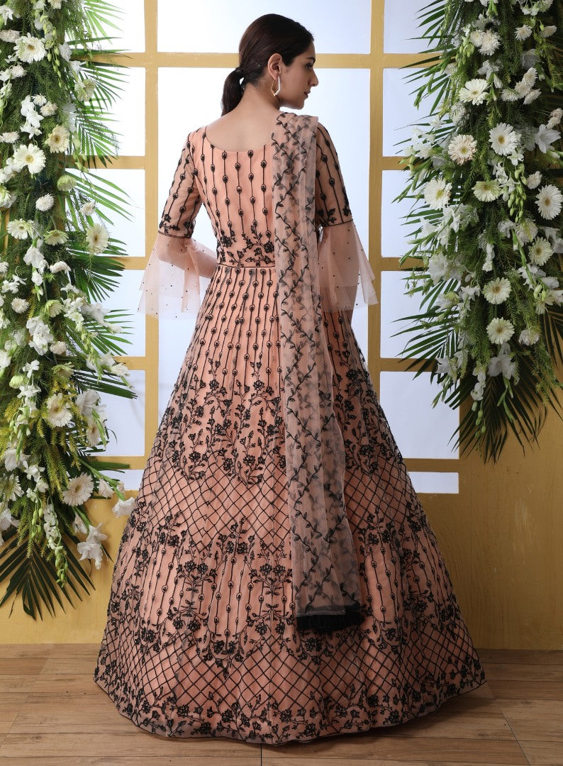 Peach net heavy embroidered wedding long anarkali gown