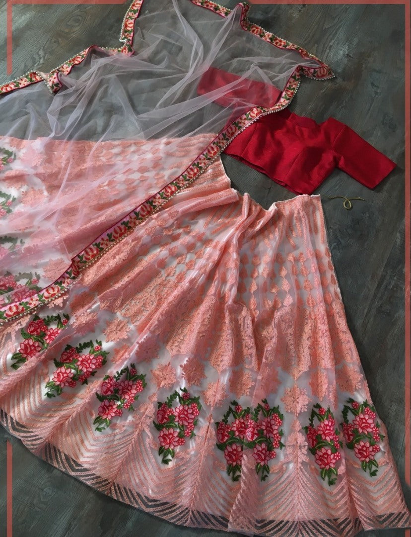 Peach net sequence embroidered ceremonial lehenga choli