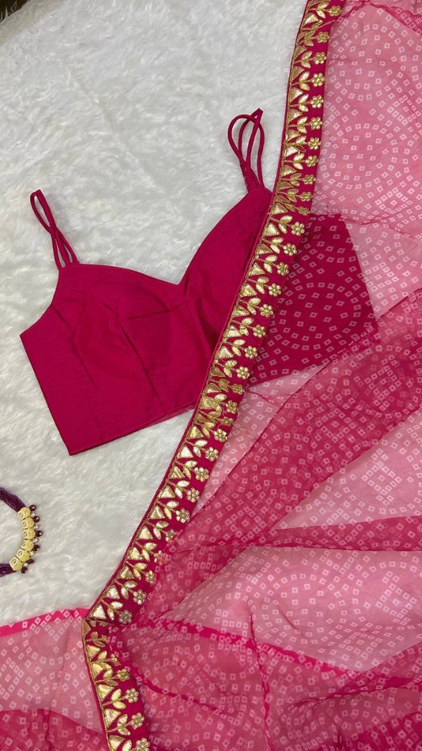 Pink bandhni print organza saree