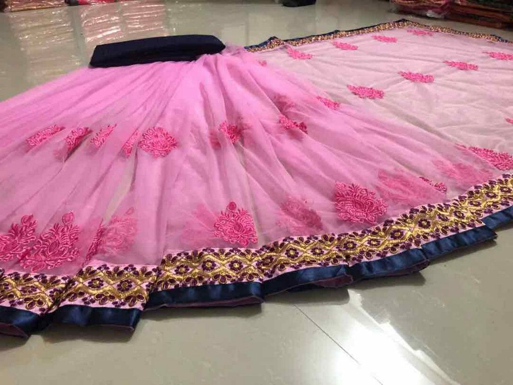 Pink net embroidered partywear saree