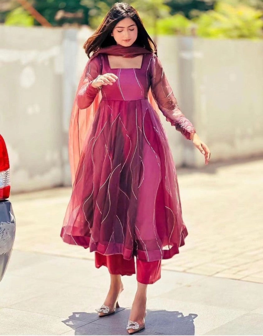 Pink organza silk print and ribbon work anarkali suit