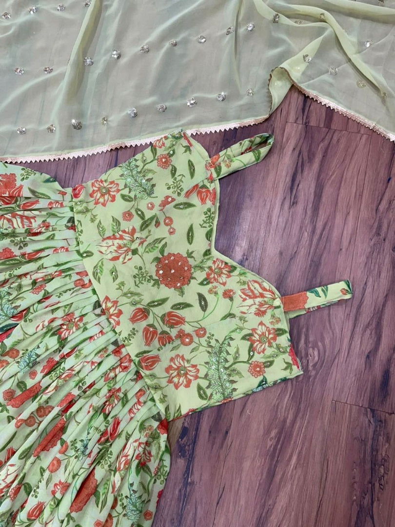 Pista green georgette flower printed and sequence work gown