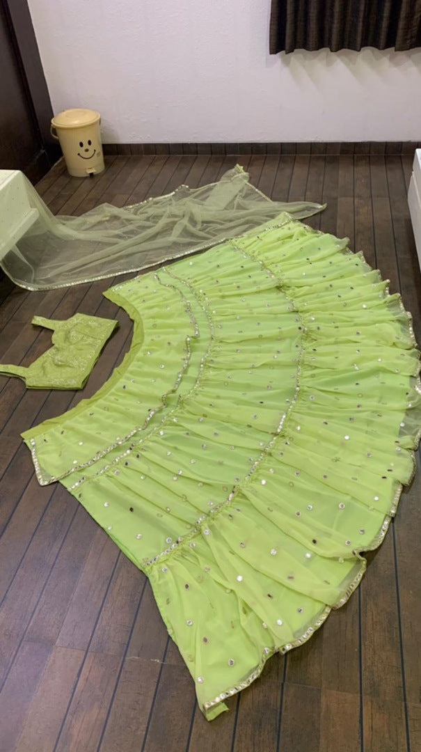 Pista green georgette paper mirror work ruffle lehenga choli