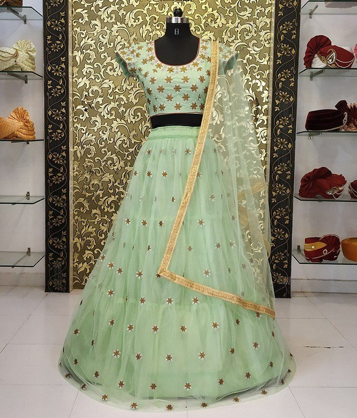 pista green net embroidered lehenga choli