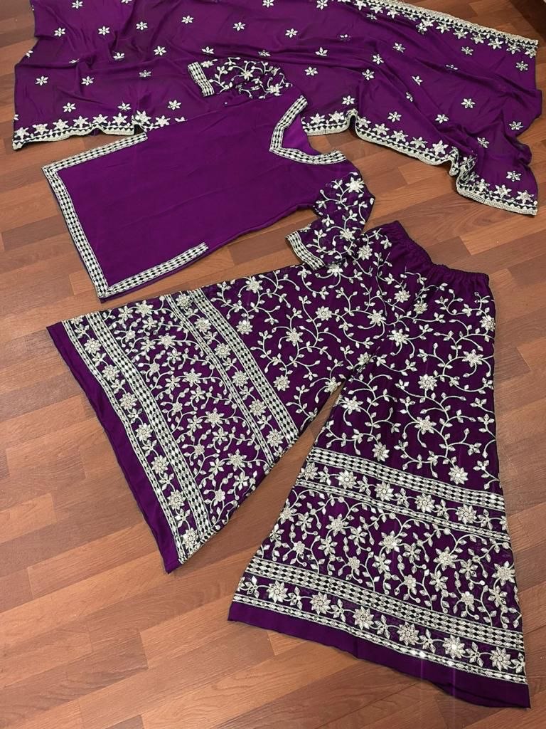 Purple georgette heavy embroidered plazzo suit