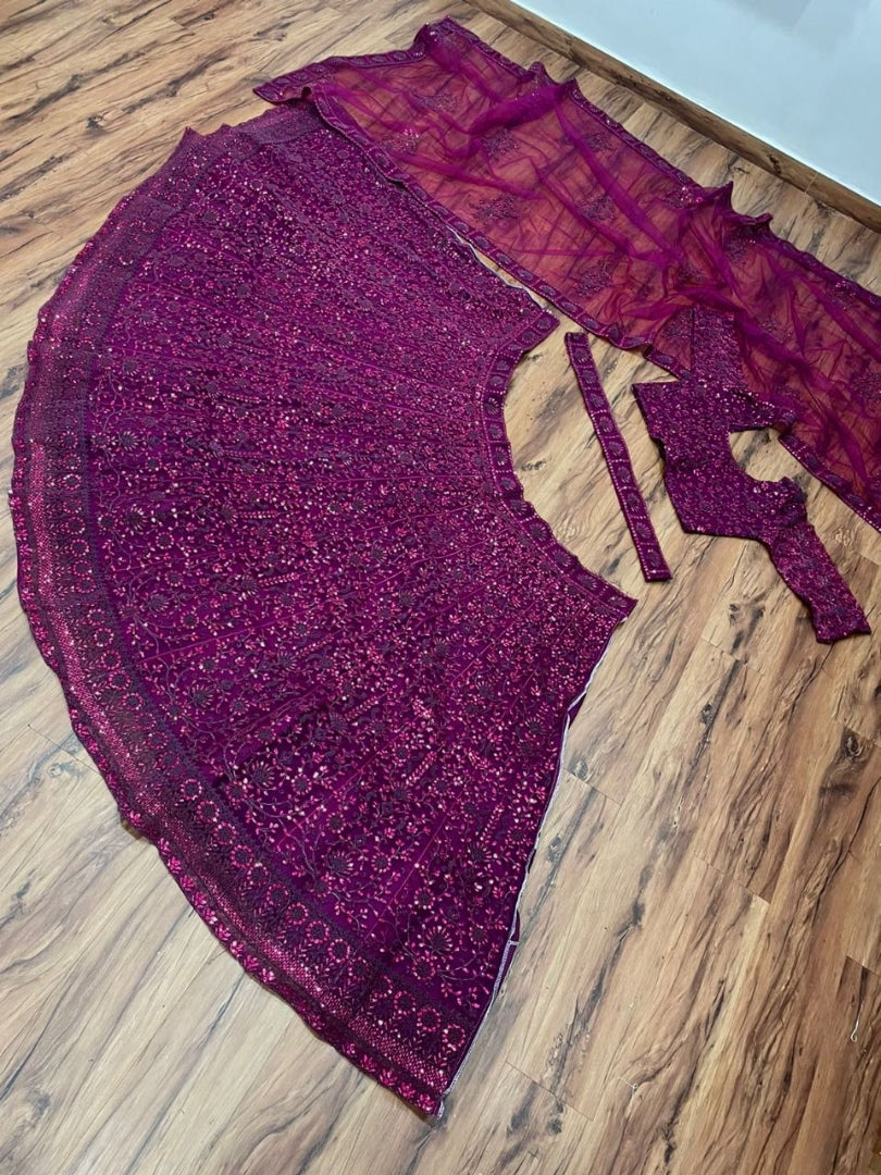 Purple net coding heavy dori work wedding lehenga choli