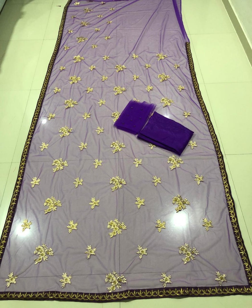 Purple net designer embroidered wedding saree