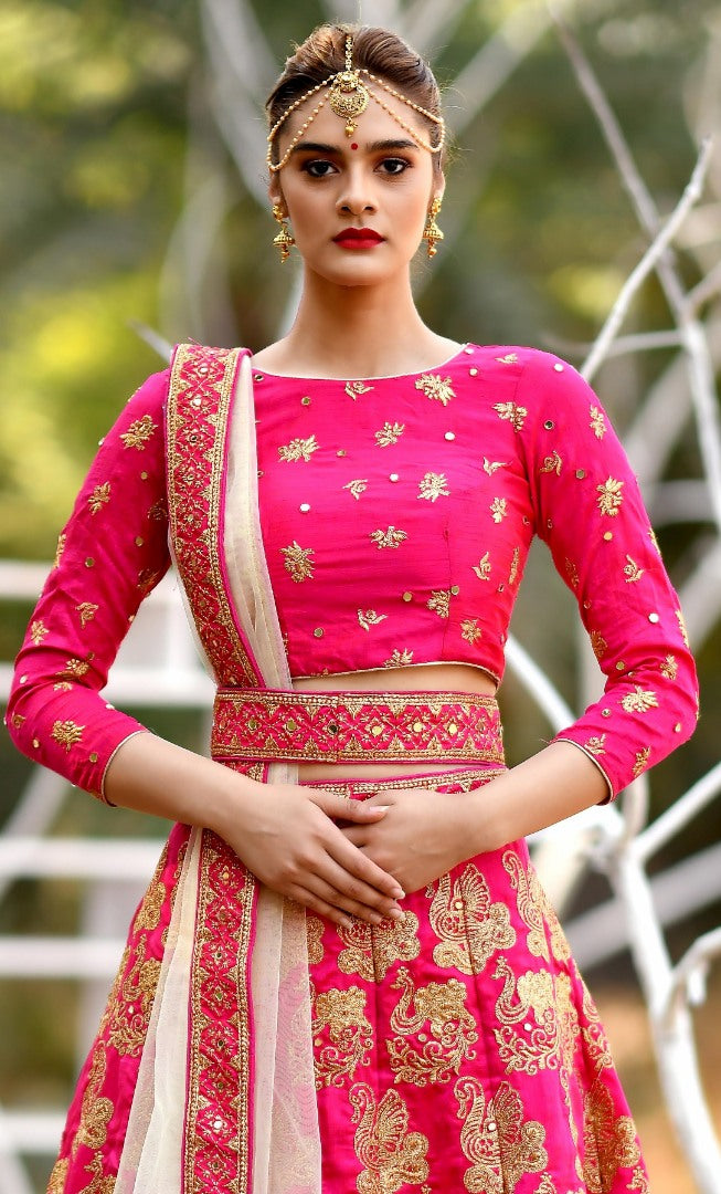 Rani pink silk designer embroidered heavy bridal lehenga choli