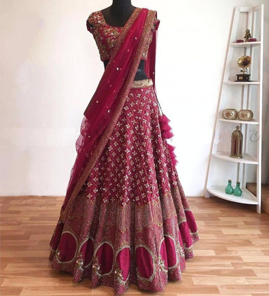 Rasberry pink heavy designer embroidered wedding lehenga