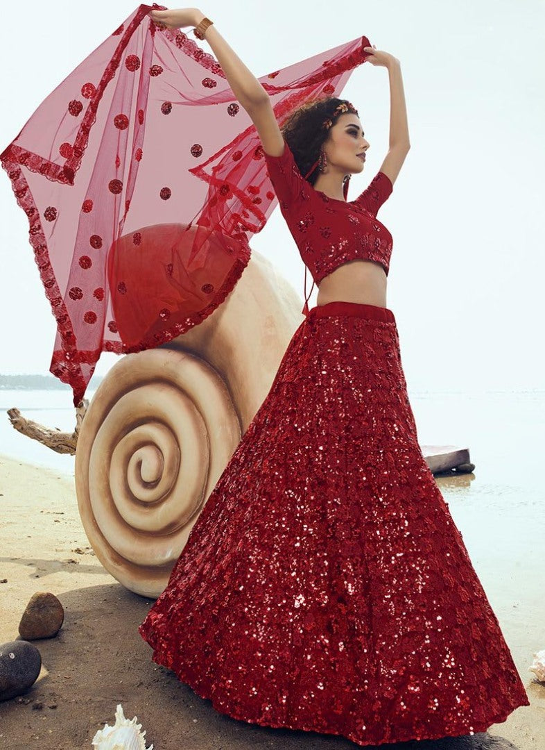 Red soft net sequence work ceremonial lehenga choli