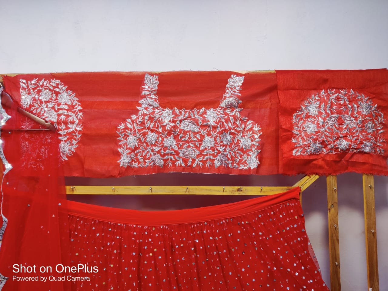 Red soft net sequence work wedding lehenga choli