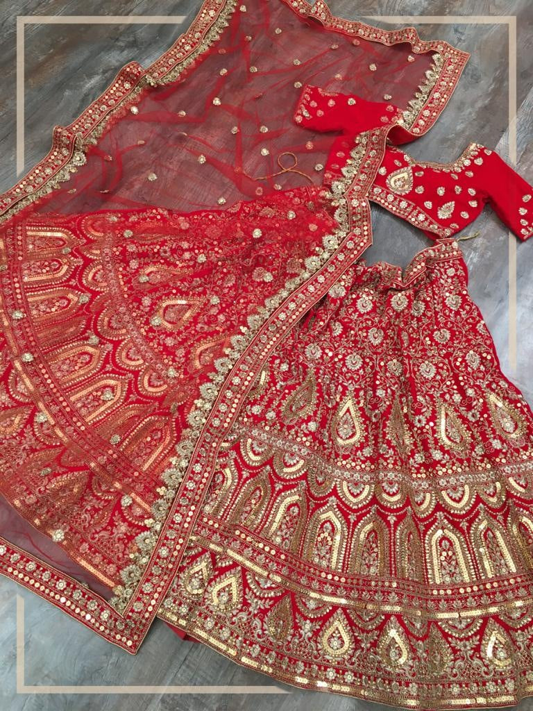 Red velvet heavy embroidered bridal lehenga choli