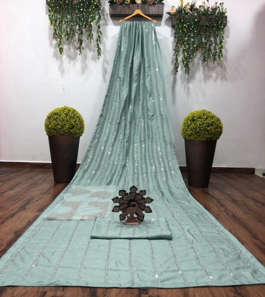 Sea green dola silk sequence work saree