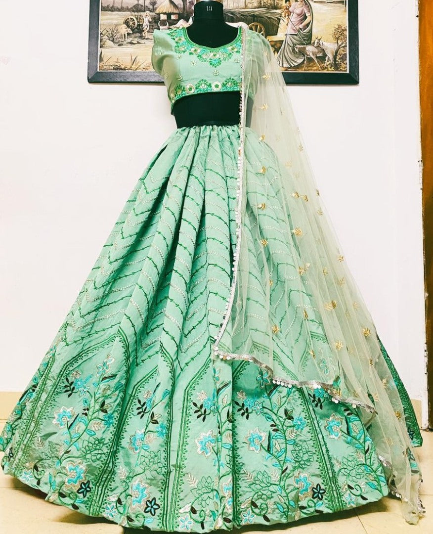 Sea green heavy taffeta silk with embroidered work lehenga choli