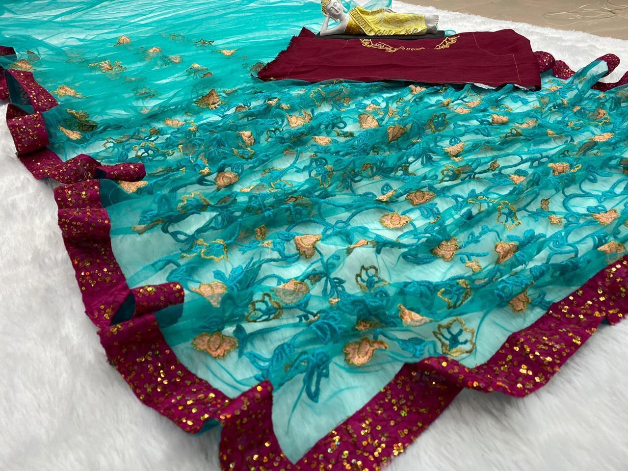 Sea green net heavy embroidered wedding saree