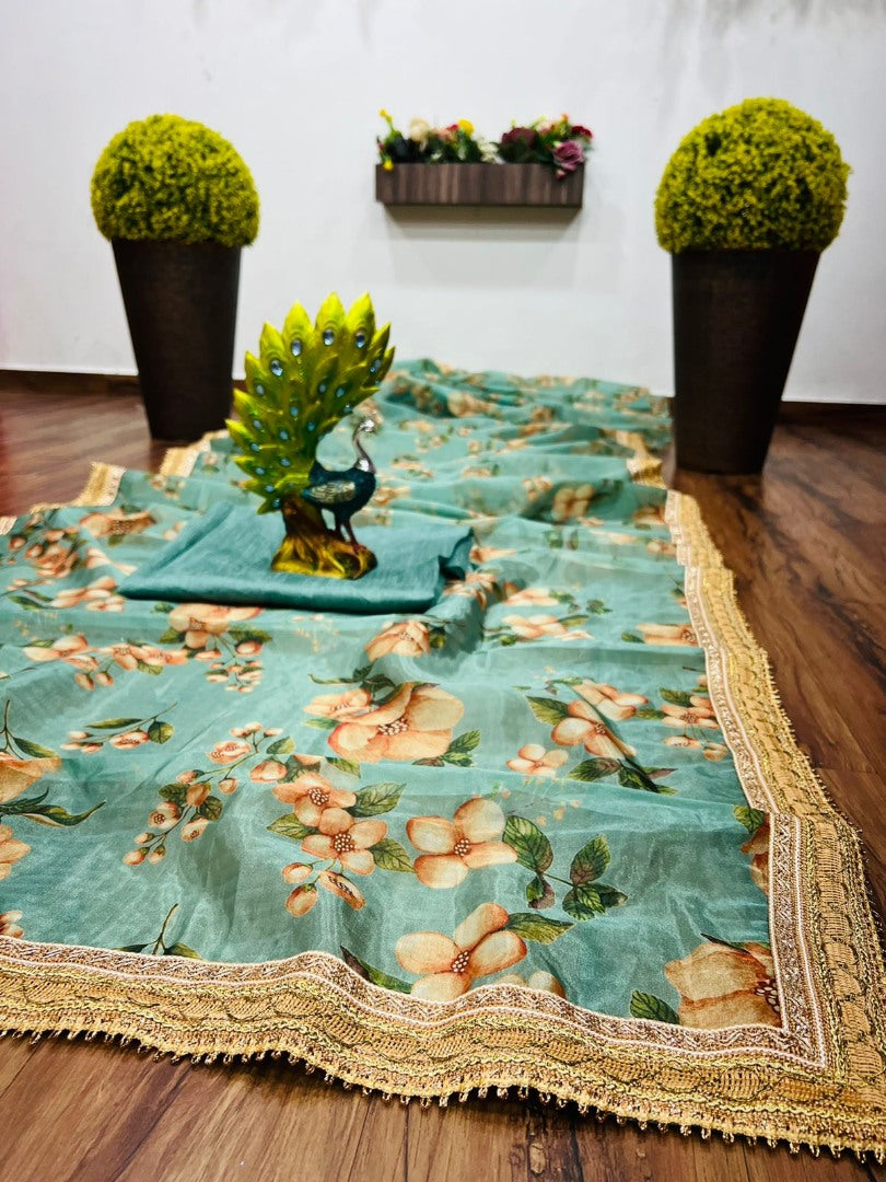 Sea green organza flower printed embroidered border saree