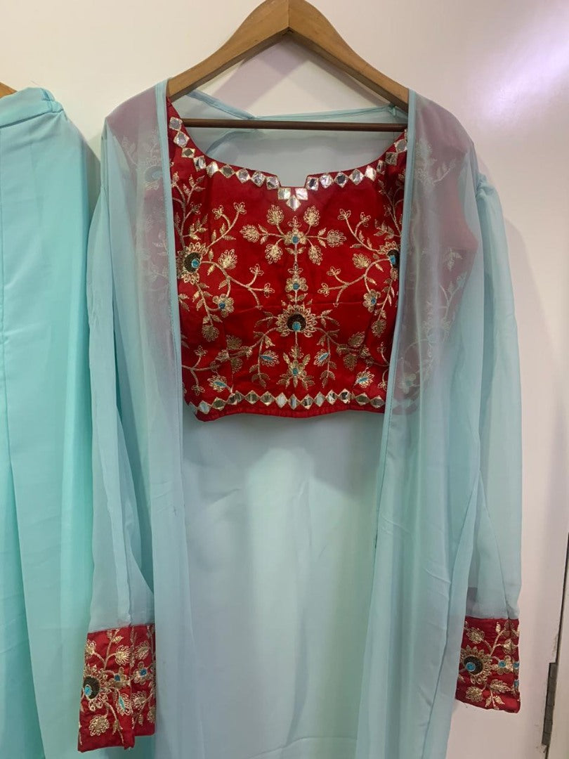 Sea green tapeta silk indowestern plazzo suit with shrug