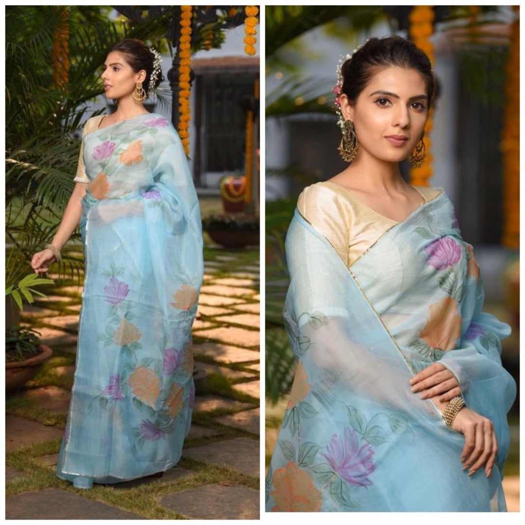 Sky blue flower printed organza saree