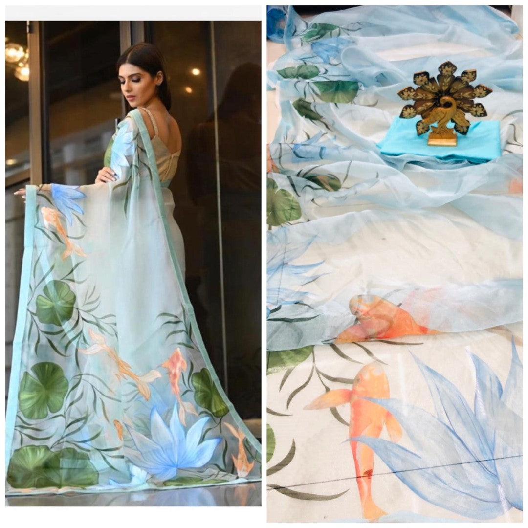 Sky blue lake printed organza saree