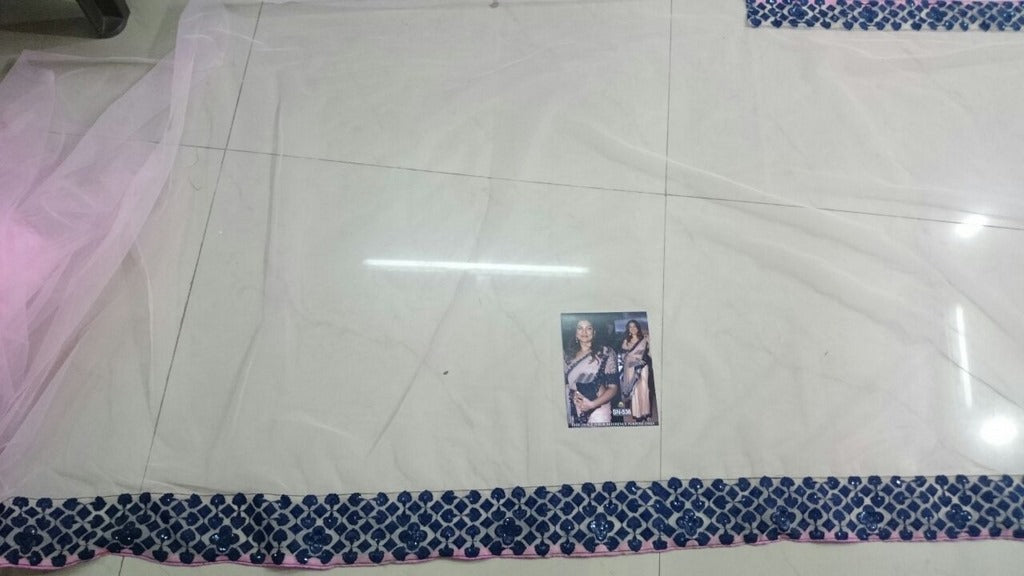 Susmita designer peach embroidered saree