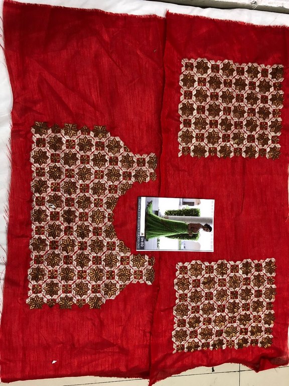 Trendy green embroidered mono net wedding saree