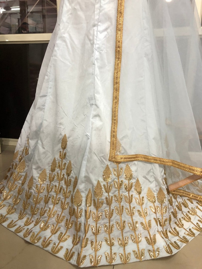 White banarasi silk embroidered ceremonial lehenga choli